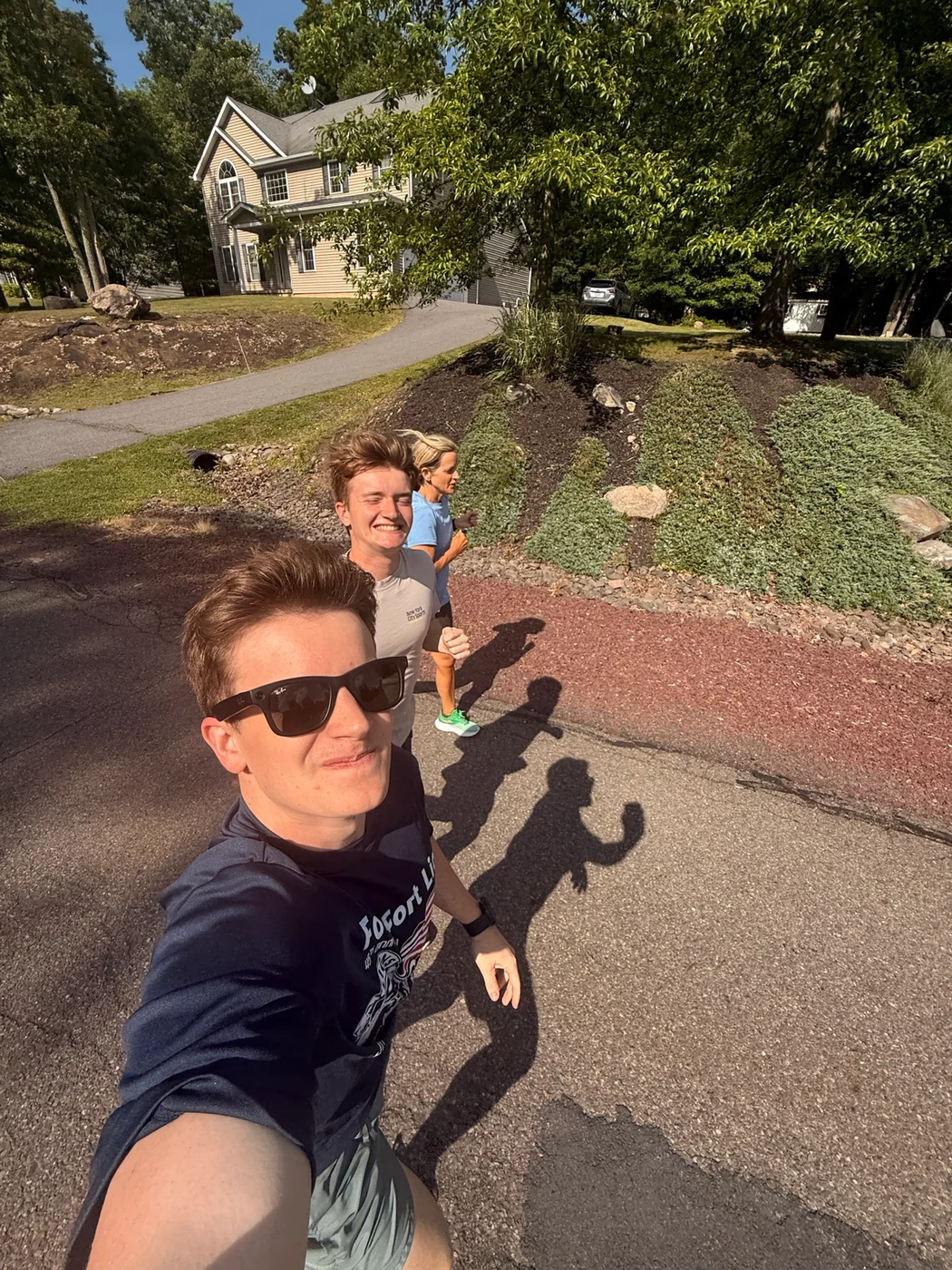 Ray running with his mom and brother